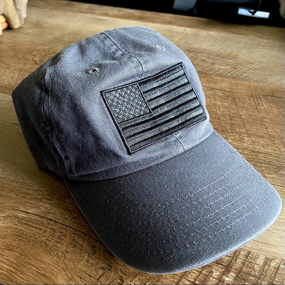 Red white and blue apparel grey hat American flag